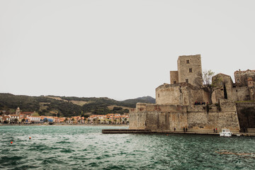 Fototapeta na wymiar Medieval Castle along the coast of the Collioure Sea, France.