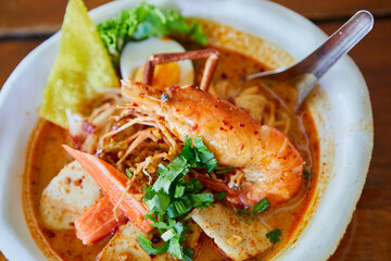 Spicy tom yum noodle with shrimp in a bowl