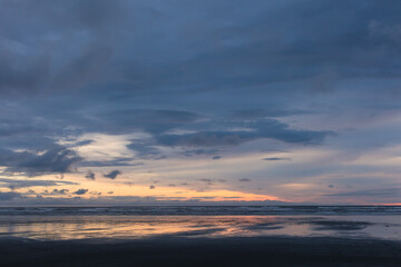 Twilight hues over a calm beach