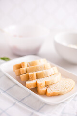 Sliced baguettes on a plate