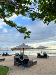 gazebo at beach against blue sky
