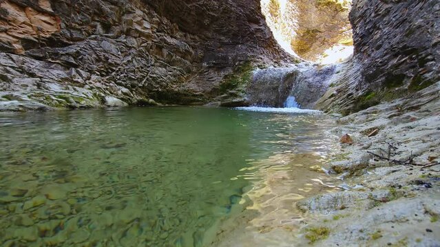 This footage captures the essence of natural tranquility, inviting viewers to immerse themselves in the peaceful ambiance of the forest. We are at "Sarnano" Italy through the forgotten waterfalls path
