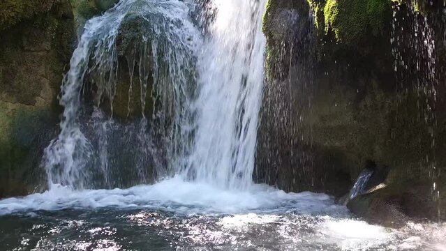 This footage captures the essence of natural tranquility, inviting viewers to immerse themselves in the peaceful ambiance of the forest. We are at "Sarnano" Italy through the forgotten waterfalls path