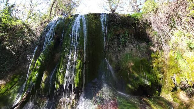 This footage captures the essence of natural tranquility, inviting viewers to immerse themselves in the peaceful ambiance of the forest. We are at "Sarnano" Italy through the forgotten waterfalls path