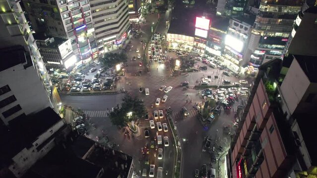 Evening Rush Hour Traffic at Intersection Aerial View