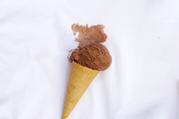 Dirty stain chocolate ice cream  on white clothes