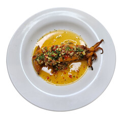 grilled squid dressing spicy sauce on white plate
