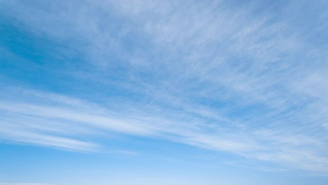 beautiful blue sky with soft white clouds timelapse for abstract background
