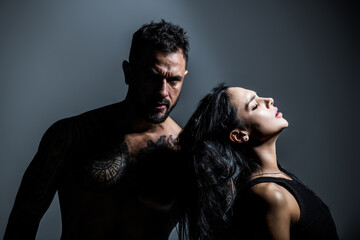 Lovely beautiful couple. Sexy woman and man. Sensual couple hugging, passion and sensual. Seduction flirt of romantic couple. Sexy moments. Romantic attractive sensual couple in love hugging.