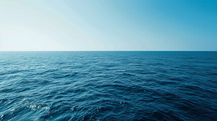 Fototapeta premium A boundless view of the ocean's horizon under the soft light of dusk, illustrating the vastness of the sea..