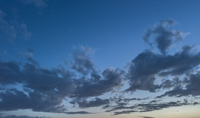 Beautiful view of a blue sky at sunset with gray clouds