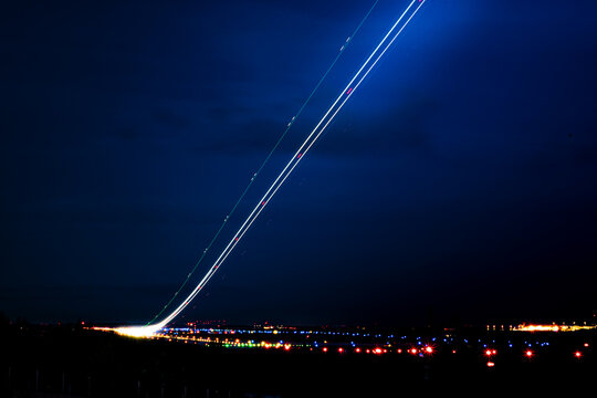 Helsinki, Finland - September 8th 2023: A long exposure shot of an airplane taking off from Helsinki-Vantaa EFHK HEL international airport.