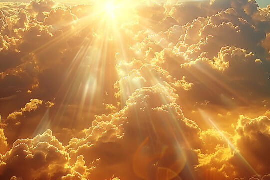 display of white and golden clouds with sunbeams breaking through