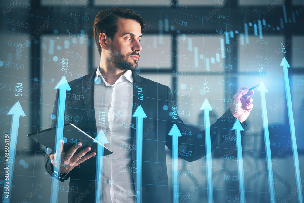 Poster attractive european businessman with tablet using growing blue vertical arrows and candlestick forex