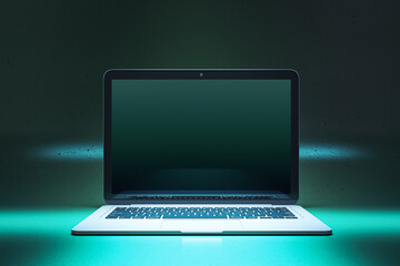 Close up of creative neon blue light gaming laptop with mock up place. 3D Rendering.