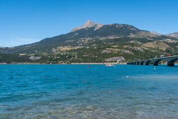 Obraz premium Beautiful summer landscape of the Lake of Serre-Poncon in Hautes-Alpes, France