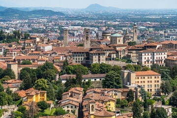 Fototapeta na wymiar Aerial view of Bergamo old town seen from San Vigilio hill, in Lombardy, Italy