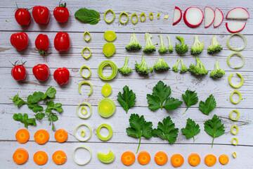 Different vegetable as parsley, rettich, tomato, leek as small parts background full of vegetable...