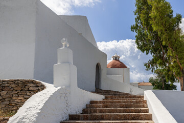 The picturesque steps leading to the iconic Puig de Missa church in Ibiza, Spain, are highlighted...