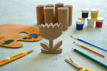 Kids craft flowers out of recycling toilet paper roll, zero waste concept. Step by step tutorial - 3.