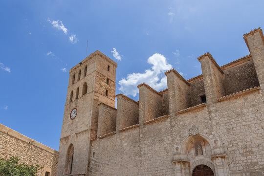 Facade of Almudaina Castle in Eivissa old town, Ibiza, stands under a clear sky, its medieval architecture a testament to the island rich history