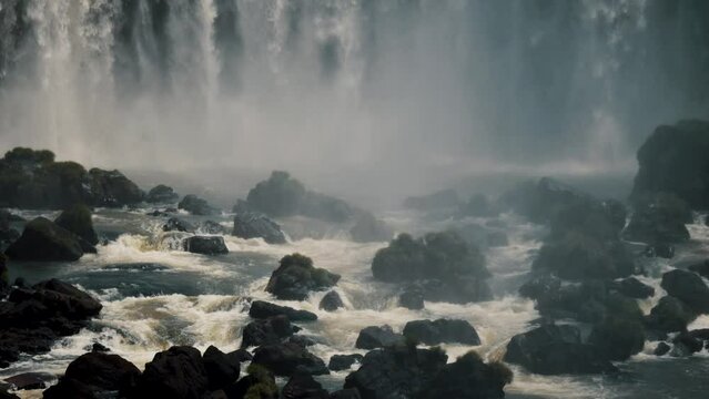 Vast Cascading Waterfall Of Iguazu Falls In Misiones Province, Argentina-Brazil Border. Slow Motion Shot