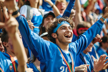 Italian Football or soccer fans cheer and support their team on tribune in football stadium