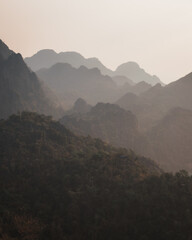Layers of mountains in the haze at sunset
