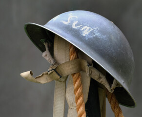 The Brodie helmet is a steel combat helmet designed and patented in London in 1915 by Latvian...