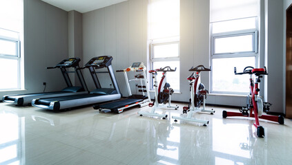 Fototapeta na wymiar Gym room with sport equipment