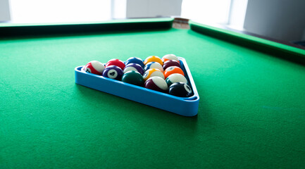 Billiard balls on pool table