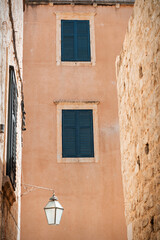 Windows on building in a street in Old town, Dubrovnik