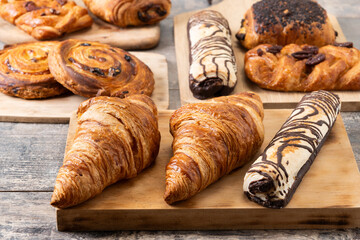 Set of bakery pastries on wooden table