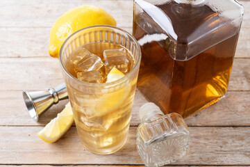 Highball, Whiskey with soda and lemon beverage on wooden table - 787012174