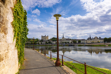 Saumur, France, located at the Loire river under a beautiful cloudscape during daytime.