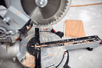Circular saw for cutting laminate hardwood floor.