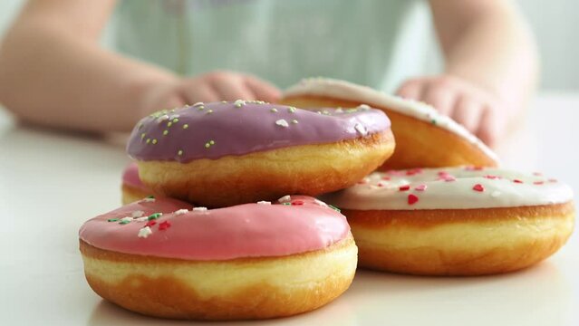 Background with donuts close-up. Trendy, national dessert. Harmful high-calorie foods. Obesity problems. The concept of a healthy lifestyle and balanced nutrition. Fry in oil. cholesterol food. June 7