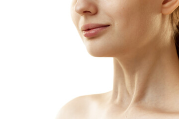Cropped photo of young woman with well-kept, rejuvenated skin at on neckline zone against white...