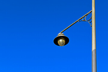 Antique street lamp against a blue sky in Petropolis, Rio de Janeiro, Brazil