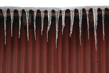Danger Icicle Frozen Spikes of ice Formed at House Roof Edge