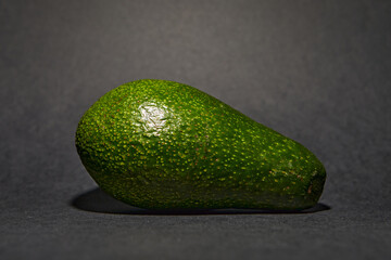 fresh avocado closeup on black background