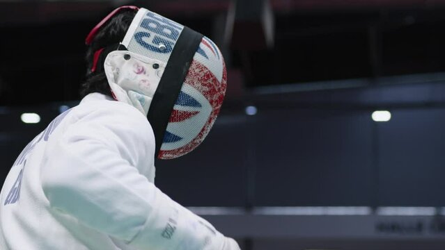 Paralympian GB Fencer, fencing close up. Paralympic fencing, competitive sports, combat sports, sword fighting, sports and fitness, health, 25fps