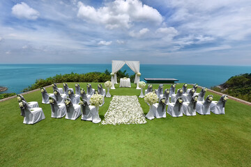 Decoration for wedding ceremony on the roof top of the beach front buiding. Outdoor wedding...