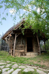 Fototapeta na wymiar Fisherman's house exterior of Serbian settlement at the banks of Danube river from Neolithic period