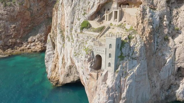 Aerial view of Porto Flavia located in Sardinia, Italy. It was a service infrastructure of the Masua mining area, no longer operational today and used as a port of embarkation for material extracted.