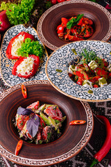 Colorful mediterranean feast on ethnic tableware