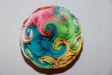 Close up of colorful handmade abstract paper balls