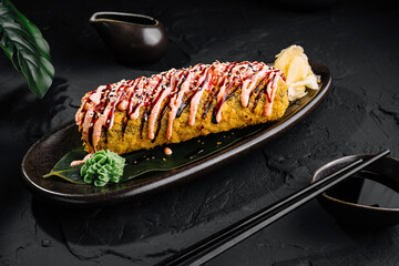 Gourmet tempura sushi roll on elegant plate