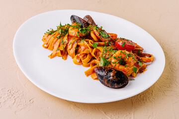 Delectable seafood pasta on white plate