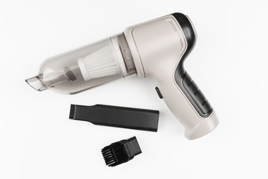 a hand-held vacuum cleaner. Small portable vacuum cleaner, isolated on white background	
